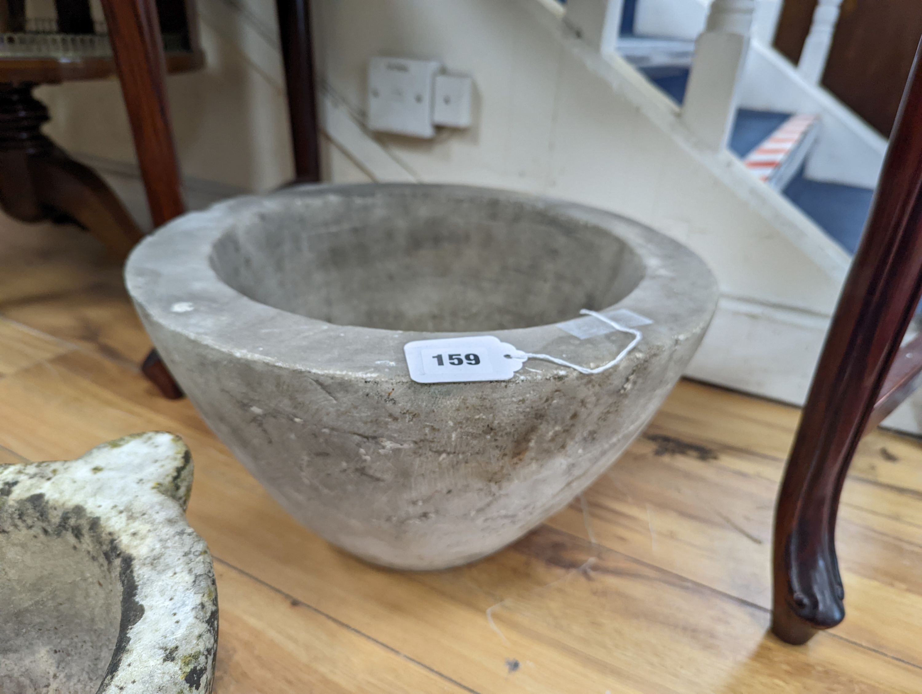 A large marble bowl and a marble mortar, larger diameter 38cm, height 21cm